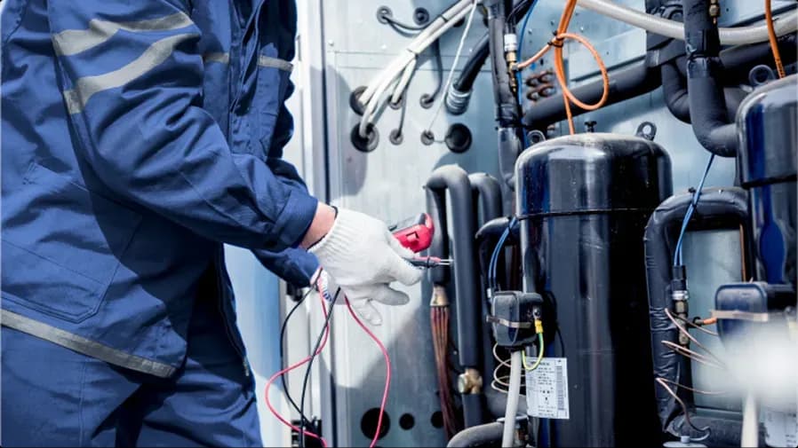 A technician using proper tools to repair an HVAC product or system