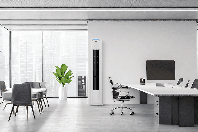 Carrier slim floor standing air conditioner in office space providing even cooling quiet operation and energy efficient comfort