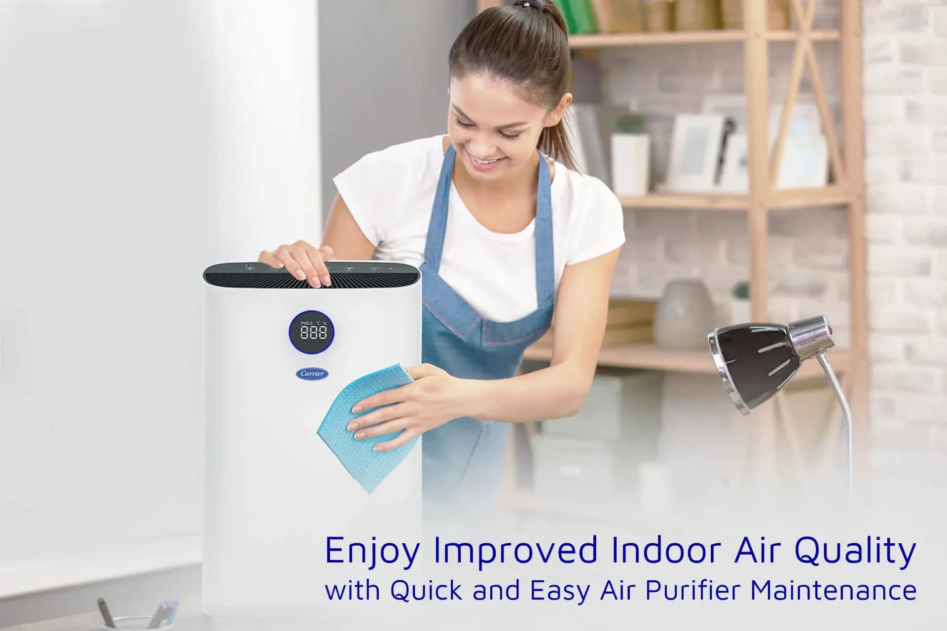 A woman enjoying improved indoor air quality with her Carrier Philippines air purifier that is quick and easy to maintain