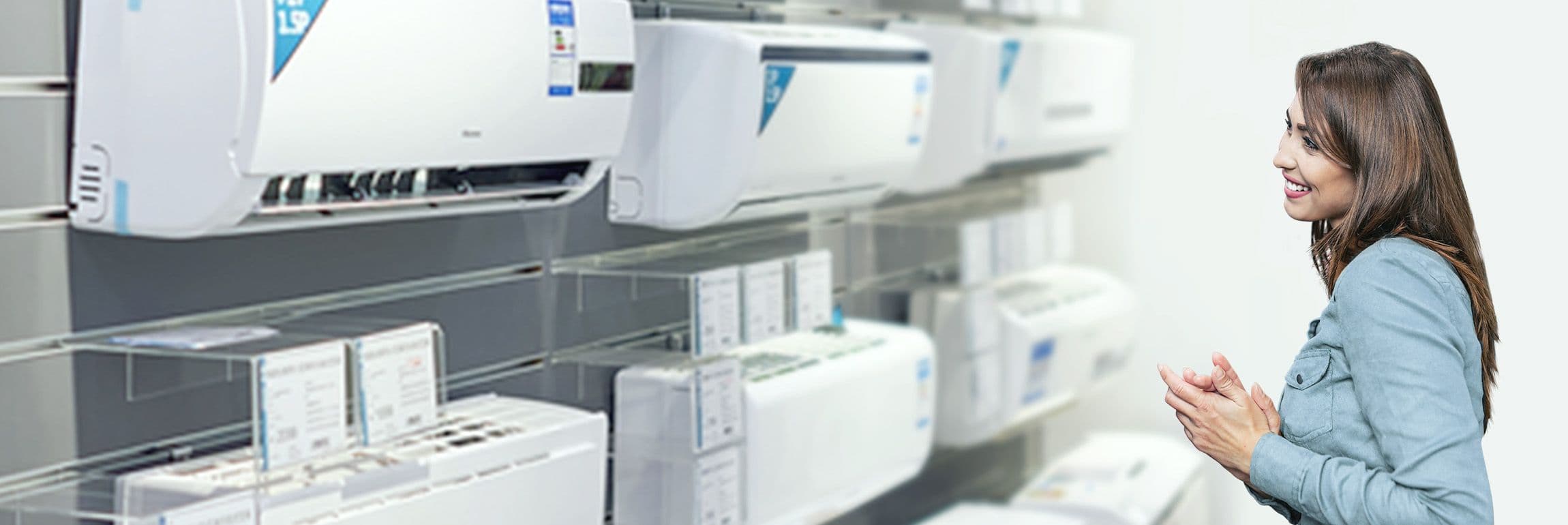 A woman deciding between an inverter aircon and non inverter air conditioner for her home