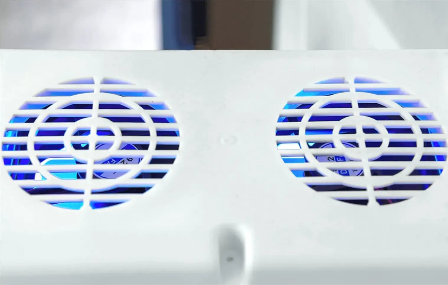 A UV air purifier sucking in air from a room and using the UV light to kill organisms as small as viruses and bacteria